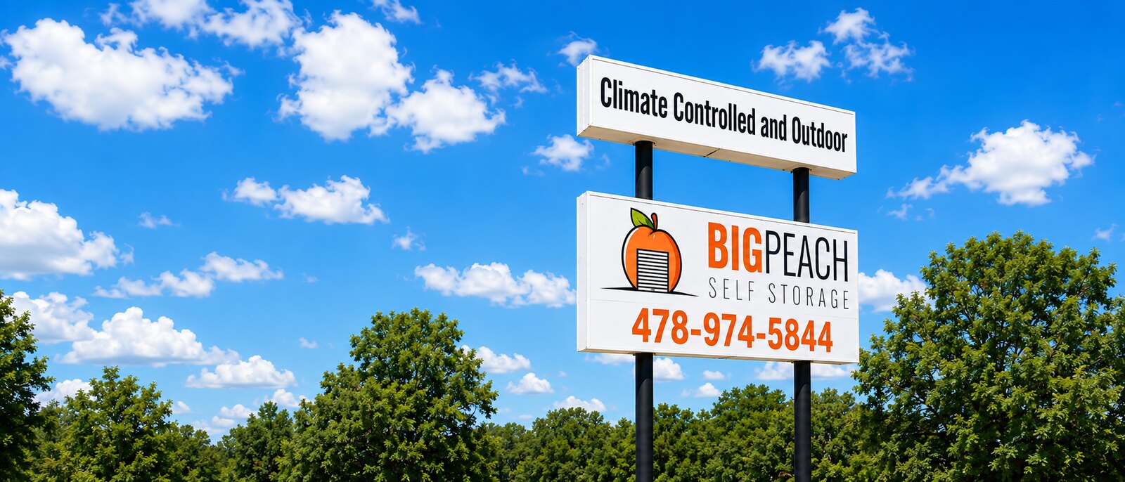 Big Peach Self Storage roadside sign: climate controlled and outdoor storage, 478-974-5844